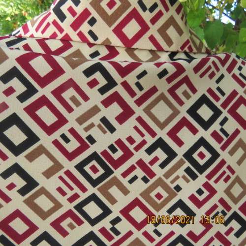 Classic geometric print cream short sleeve top with maroon/black print. Size 36/12.By OXYZONE.