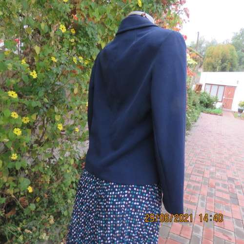 Best quality virgin wool and trevira navy jacket by NINO FLAIR from West Germany. Size 36/12.As new