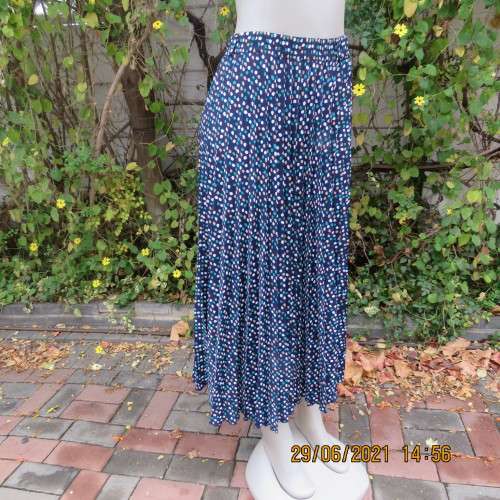 As new half flare permanent pleated navy ankle length skirt with jade/white/cream dots..Size 42/18.