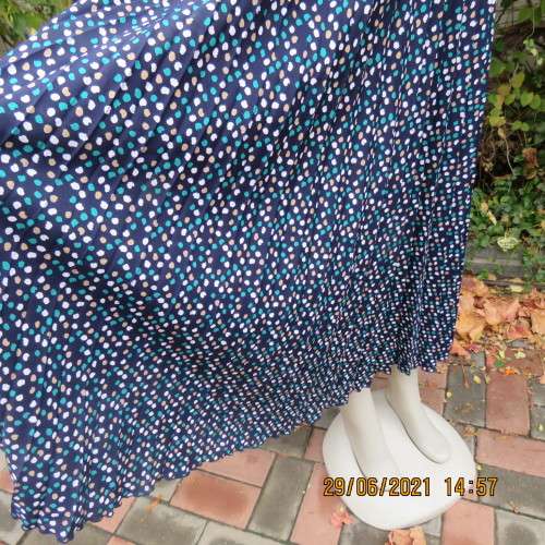 As new half flare permanent pleated navy ankle length skirt with jade/white/cream dots..Size 42/18.