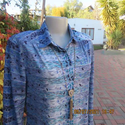 Fabulous vintage shift dress in medley of blues.Hidden button down halfway.Size 36/38 .BEVERLEY BOND