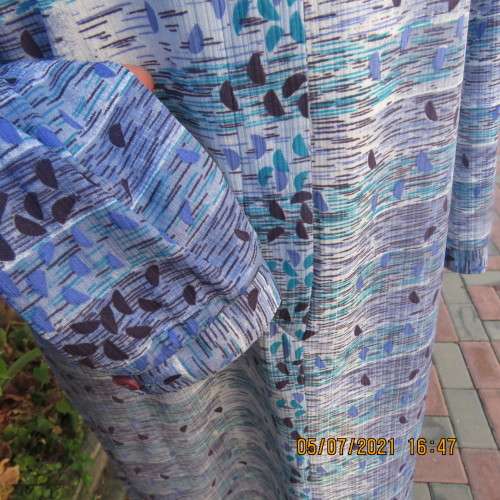 Fabulous vintage shift dress in medley of blues.Hidden button down halfway.Size 36/38 .BEVERLEY BOND