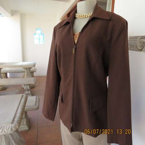 Choc brown zip-up jacket tailored for sophistication. Fully lined.By OASIS size 38/14.New condition.