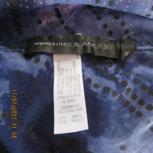 Evening top by TRUWORTHS GLAMOUR in medley of blues. Embellished.Cowl neckline.Size 38/14.
