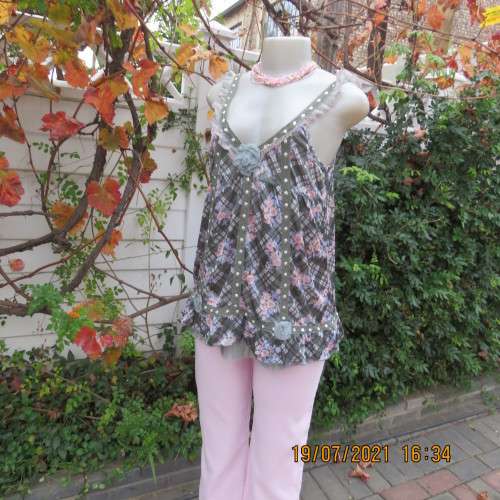Summer olive green-cream check with blue-peach flowers.Adjustable straps.Size 34.As new