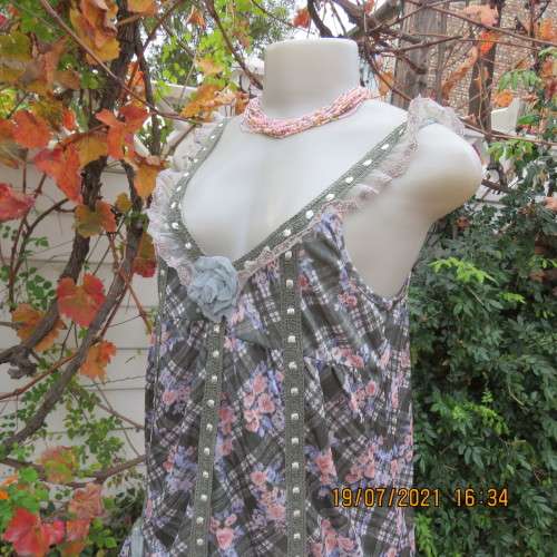 Summer olive green-cream check with blue-peach flowers.Adjustable straps.Size 34.As new