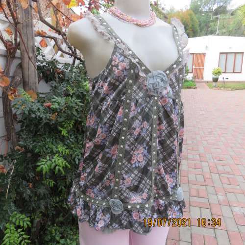 Summer olive green-cream check with blue-peach flowers.Adjustable straps.Size 34.As new