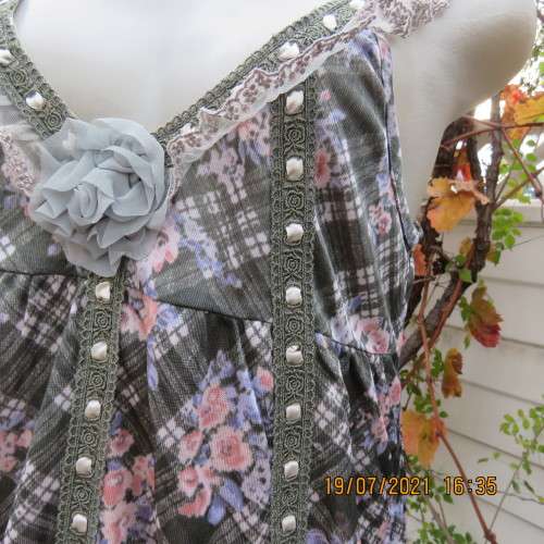 Summer olive green-cream check with blue-peach flowers.Adjustable straps.Size 34.As new