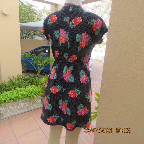 Sweet size 36/12 slip over mini dress with black/white polkadot background and floral design.