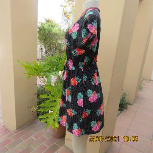 Sweet size 36/12 slip over mini dress with black/white polkadot background and floral design.