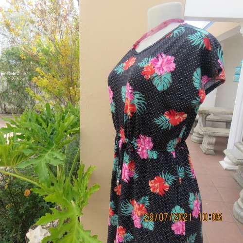 Sweet size 36/12 slip over mini dress with black/white polkadot background and floral design.