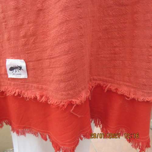 Cool summer strappy top by ANT WEAR size 44/20 in burnt orange 100% cotton. Ruffled edging.