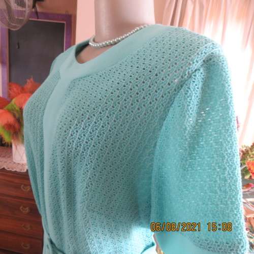 High quality vintage dress by MARCHESA from DELSWA size 42/18 in aquamarine crimplene.As new