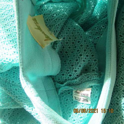 High quality vintage dress by MARCHESA from DELSWA size 42/18 in aquamarine crimplene.As new