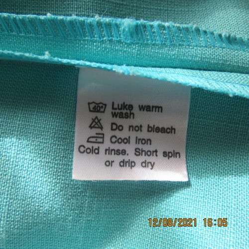 Fresh aquamarine colour short sleeve jacket  with sweetheart neckline by KARISMA size 36/12.As new