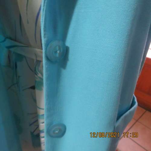 Classic skyblue short sleeve jacket by DELSWA size 36/38. Large front pockets. Button down.As new.