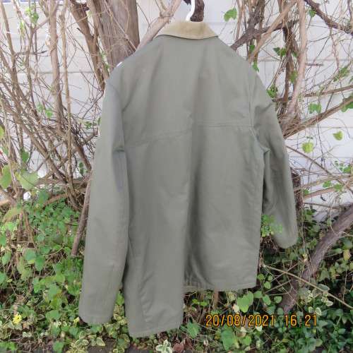 Ultimate in quality!.STERLING men`s Medium jacket in pale army green.Cotton outer - corduroy inner.