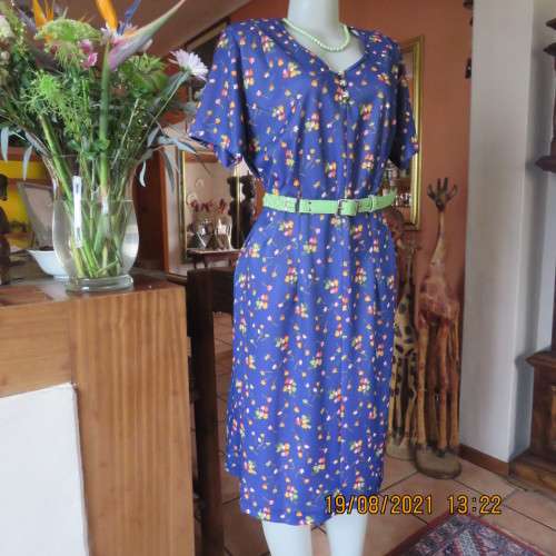 Vintage boutique shift dress. Royal blue with orange/pink and lime green flowers.Size 42/18.As new