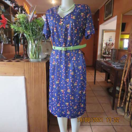 Vintage boutique shift dress. Royal blue with orange/pink and lime green flowers.Size 42/18.As new
