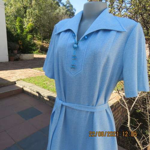 As new  80`s vintage dress in sky blue mottled look by PRINCESS size 44/20. Lapel collar. With belt.