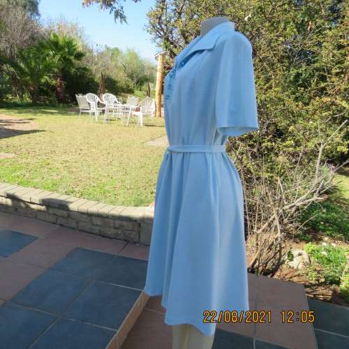 As new  80`s vintage dress in sky blue mottled look by PRINCESS size 44/20. Lapel collar. With belt.