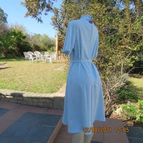 As new  80`s vintage dress in sky blue mottled look by PRINCESS size 44/20. Lapel collar. With belt.