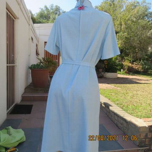As new  80`s vintage dress in sky blue mottled look by PRINCESS size 44/20. Lapel collar. With belt.
