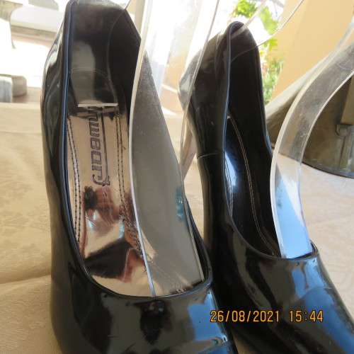 Pair sharp pointed black pumps with patent leather look and silver stiletto heels.By INWEAR size 7.
