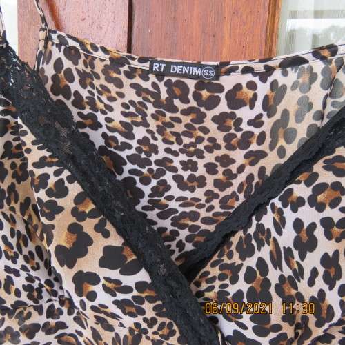 Animal print sexy top by RT Denim, size 30/6, adjustable thin straps, fold over bust