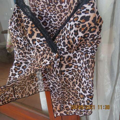Animal print sexy top by RT Denim, size 30/6, adjustable thin straps, fold over bust