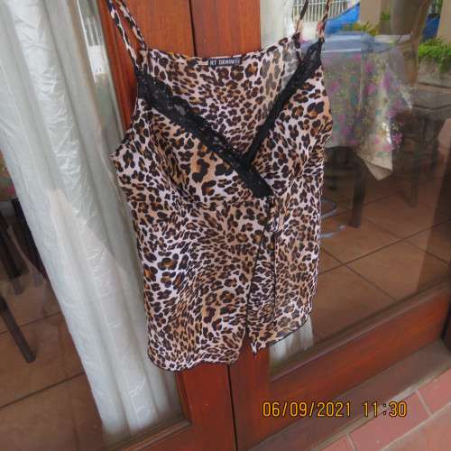 Animal print sexy top by RT Denim, size 30/6, adjustable thin straps, fold over bust
