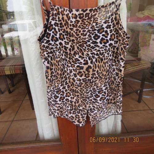 Animal print sexy top by RT Denim, size 30/6, adjustable thin straps, fold over bust