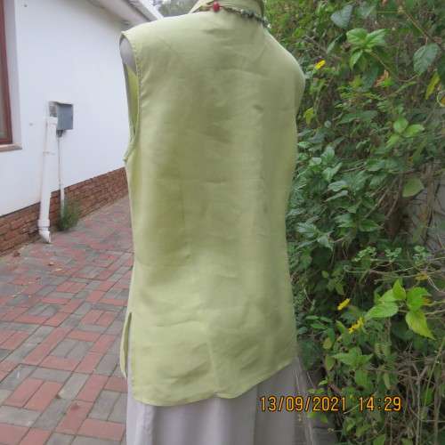 Yellowgreen 100% linen sleeveless button down top. By WOOLWORTHS in size 38/14. In new condition.