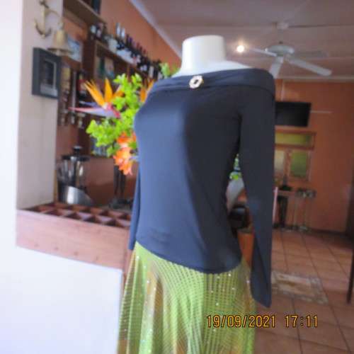 Hot black off the shoulder top by H+M size 32/8. Fold over collar. Poly stretch fabric. As new.