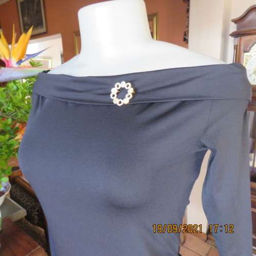 Hot black off the shoulder top by H+M size 32/8. Fold over collar. Poly stretch fabric. As new.