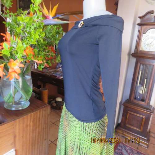 Hot black off the shoulder top by H+M size 32/8. Fold over collar. Poly stretch fabric. As new.