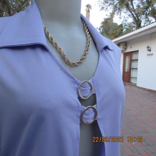 Sexy lavender colour sleeveless top in stretch polyester. Size 38/14 by MIRAGE. Very good condition.
