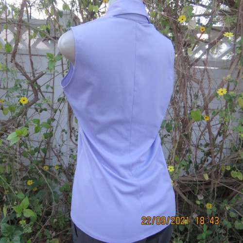 Sexy lavender colour sleeveless top in stretch polyester. Size 38/14 by MIRAGE. Very good condition.