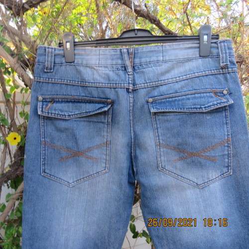 Fashion creative RT blue denim men`s jeans size 36 to 38.Two sets of pockets front.One set at back