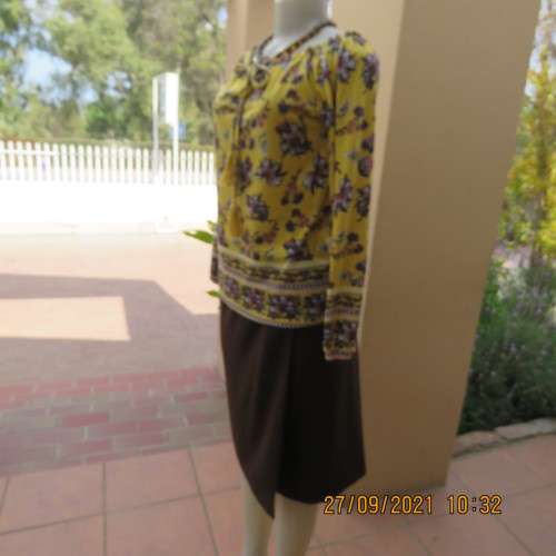 Feminine mustard yellow off the shoulder long sleeve top with crimson.maroon flowers.Size 32 to 34.