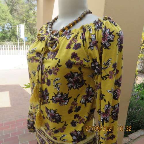 Feminine mustard yellow off the shoulder long sleeve top with crimson.maroon flowers.Size 32 to 34.