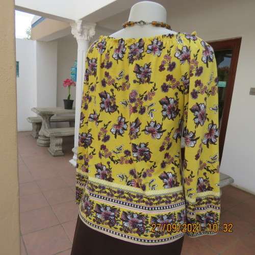 Feminine mustard yellow off the shoulder long sleeve top with crimson.maroon flowers.Size 32 to 34.