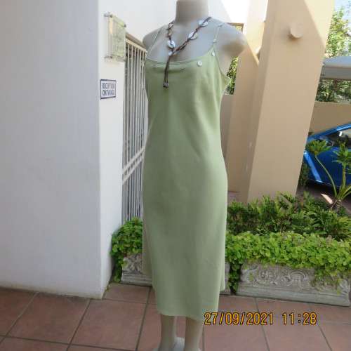 Go feminine in this apple green strappy fully lined dress.Size 36/12 by DEFINE.In linen/cotton blend