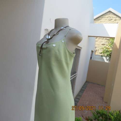 Go feminine in this apple green strappy fully lined dress.Size 36/12 by DEFINE.In linen/cotton blend