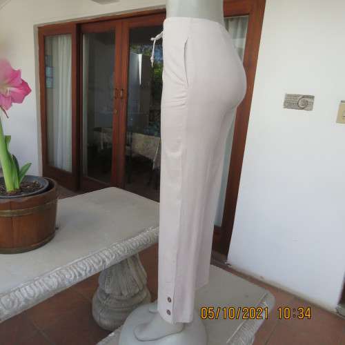 Stylish beige ML Classics linen/rayon blend pants.Size 32/8.Side pockets.Slits on legs with buttons.
