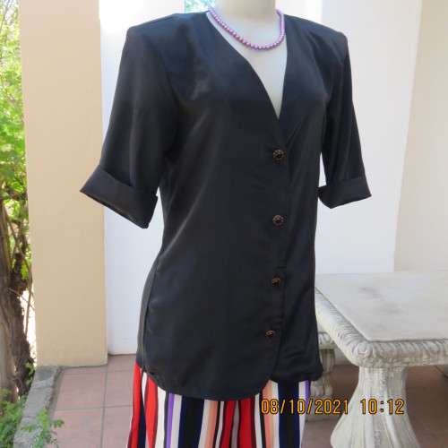 Elegant tailored black silky,shiny top/jacket. V neck,short sleeves and button down.Size 36 from UK.