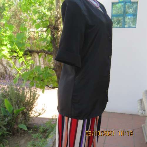 Elegant tailored black silky,shiny top/jacket. V neck,short sleeves and button down.Size 36 from UK.