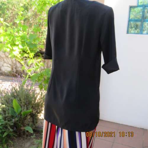 Elegant tailored black silky,shiny top/jacket. V neck,short sleeves and button down.Size 36 from UK.