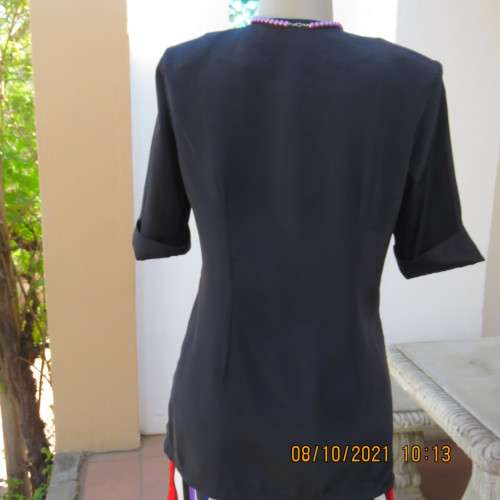 Elegant tailored black silky,shiny top/jacket. V neck,short sleeves and button down.Size 36 from UK.
