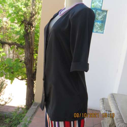 Elegant tailored black silky,shiny top/jacket. V neck,short sleeves and button down.Size 36 from UK.